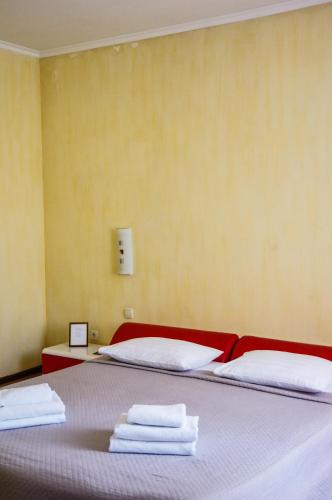 Postel nebo postele na pokoji v ubytování Hotel Marinara