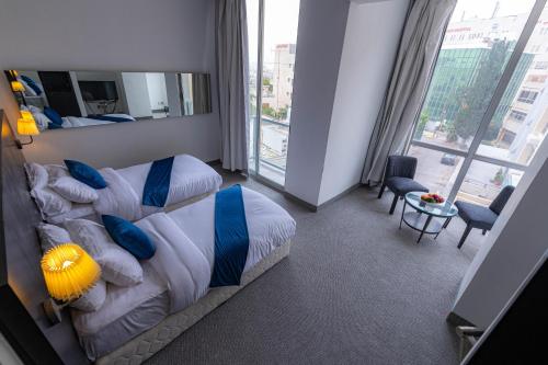 Boho Boutique Hotel Ammanにあるベッド