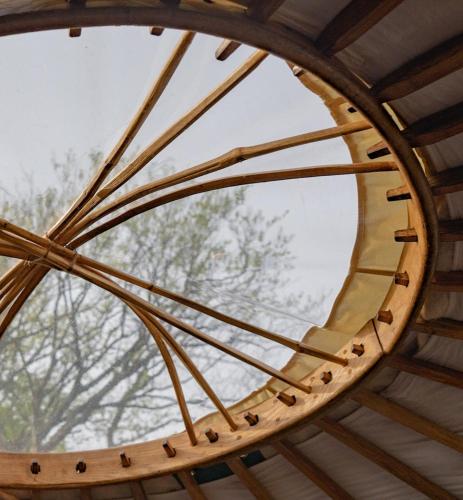 a wooden spiral staircase in a wooden roof at Little Oakhurst in Clitheroe