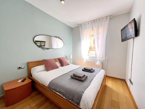Postel nebo postele na pokoji v ubytování Gracia Village Barcelona