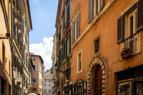 an alley in a city with buildings at Home at Rome Luxury Navona in Rome
