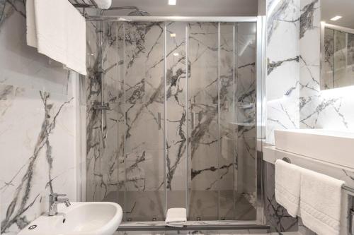 a bathroom with a shower and a sink at Home at Rome Luxury Navona in Rome