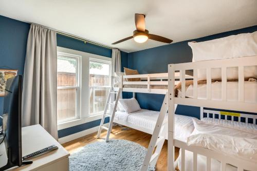 a bedroom with two bunk beds and a desk at Frisco Vacation Rental in Rail District with Hot Tub in Frisco
