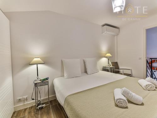 Katil atau katil-katil dalam bilik di Duplex 4 étoiles, vue mer et port de plaisance