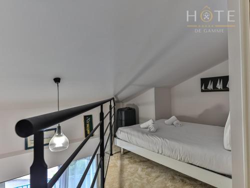 Katil atau katil-katil dalam bilik di Duplex 4 étoiles, vue mer et port de plaisance
