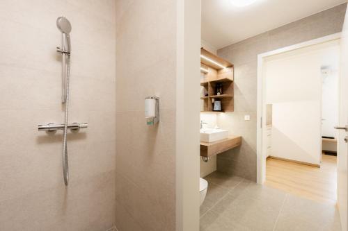 Koupelna v ubytování Apartments Gros