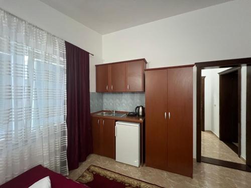 Kuchyň nebo kuchyňský kout v ubytování Kasneci Apartments