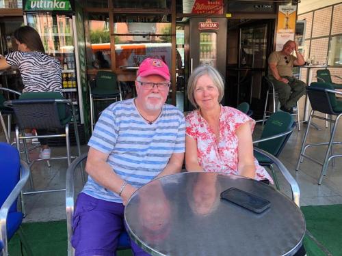 a man and a woman sitting at a table at Haus Viktoria near Banja Luka in Banja Luka