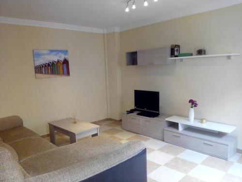 Apartamentos Decada Malaga TV 또는 엔터테인먼트 센터