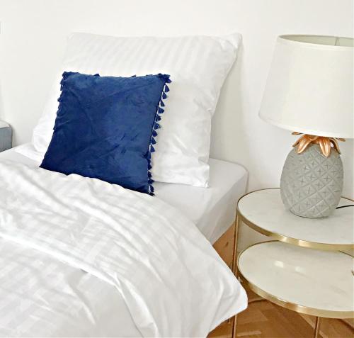 Кровать или кровати в номере Apartament K11