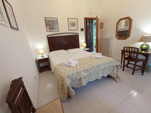 Locanda Prato d'Eraにあるベッド