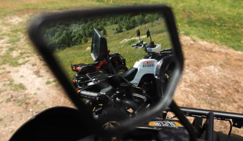 a reflection of a motorcycle in a side view mirror at Natures Escape Kozarica in Šavnik
