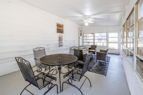 a dining room with a table and chairs at Nature Lover's Paradise. in Zephyrhills