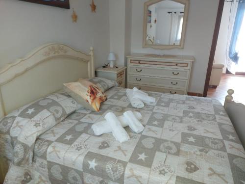 Postel nebo postele na pokoji v ubytování STELLA MARINA - IUN Q4042