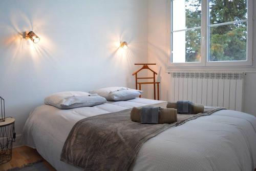 Postel nebo postele na pokoji v ubytování CyclodeLoire vue splendide