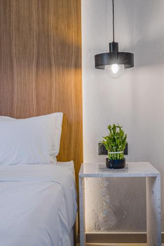 Katil atau katil-katil dalam bilik di Notos Heights Hotel & Suites