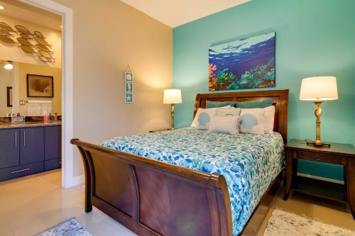 a bedroom with a bed and a kitchen at South Padre Island Vacation Rental with Pool Access! in South Padre Island