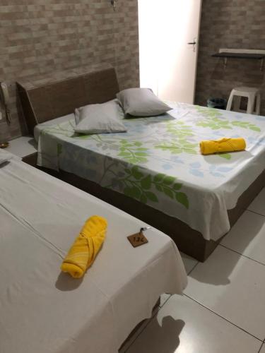 Säng eller sängar i ett rum på M-Blue Hotel