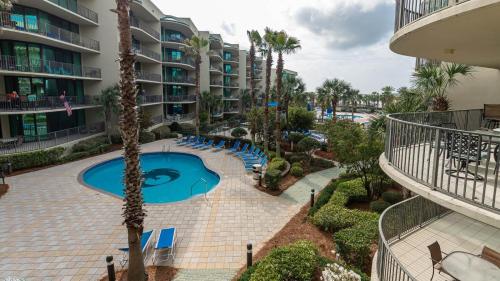 an aerial view of the pool at a resort at Phoenix on the Bay 1216 condo in Orange Beach