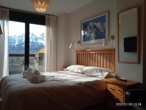 Postel nebo postele na pokoji v ubytování Apartamento Argualas V WOWRURAL