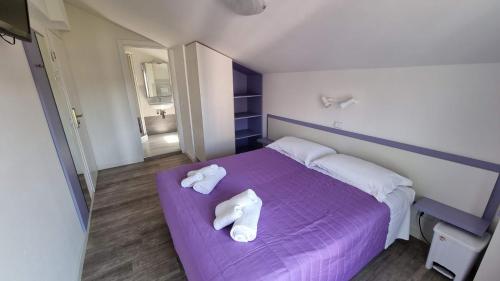 Postel nebo postele na pokoji v ubytování Hotel Canoa