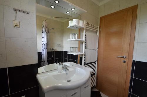 Ванная комната в Apartment Loza