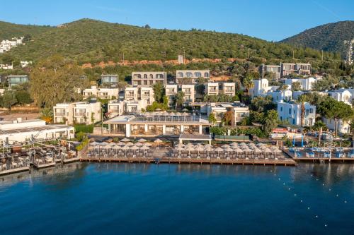 an aerial view of a resort on the water at Trendlife Hotels Torba in Bodrum City