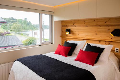 Postel nebo postele na pokoji v ubytování Del Pescador Hotel Cabañas