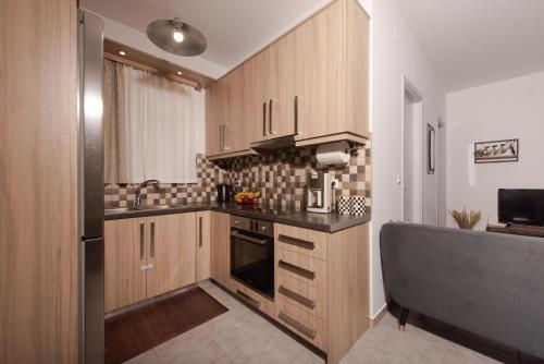 Kuchyň nebo kuchyňský kout v ubytování Koukounaria House