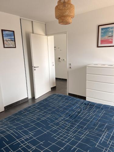 Ένα ή περισσότερα κρεβάτια σε δωμάτιο στο Appartement T2 Muses
