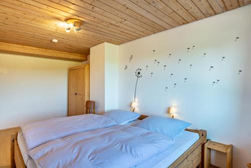 Postel nebo postele na pokoji v ubytování Haus Erlenmaier