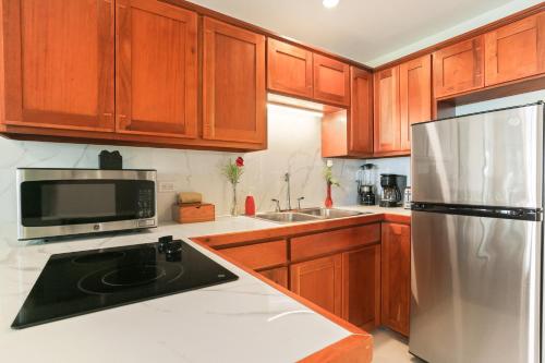 Η κουζίνα ή μικρή κουζίνα στο SunBreeze Suites
