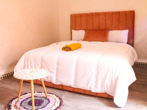 Postel nebo postele na pokoji v ubytování Akwaba lodge