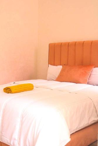 Postel nebo postele na pokoji v ubytování Akwaba lodge