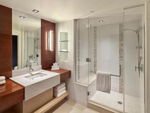 a bathroom with a sink and a shower at MGM Tower at Borgata in Atlantic City