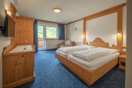 Postel nebo postele na pokoji v ubytování B&B 2000 - Panorama Pension