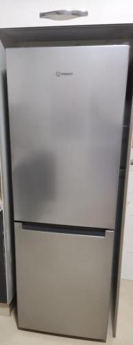 a white refrigerator freezer sitting in a kitchen at Nador New in Nador