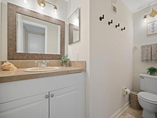 a bathroom with a sink and a toilet at Jacksonville Sea Spray 2B, 1 Bedroom, Beachfront, Sleeps 2 in Jacksonville Beach