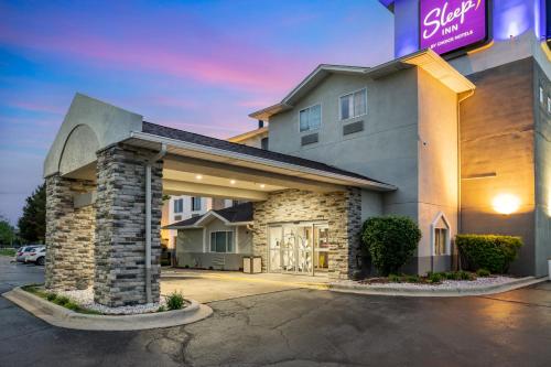 a hotel with a sign that reads sleep inn at Sleep Inn Naperville - Chicago in Naperville