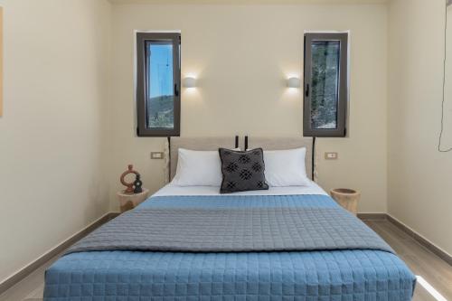 Postel nebo postele na pokoji v ubytování J&C Luxury Villa
