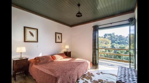 Кровать или кровати в номере Silêncio, natureza, aconchego, mountain bike