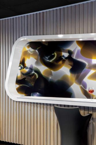 a painting of batman on a wall at Prize by Radisson, Erfurt City in Erfurt