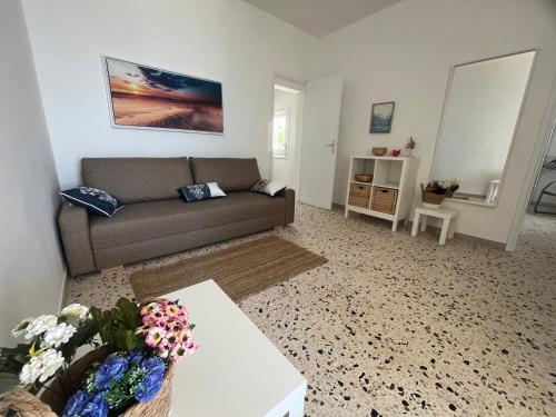 Χώρος καθιστικού στο Appartamento SOLE in Villa Giulia sul Mare