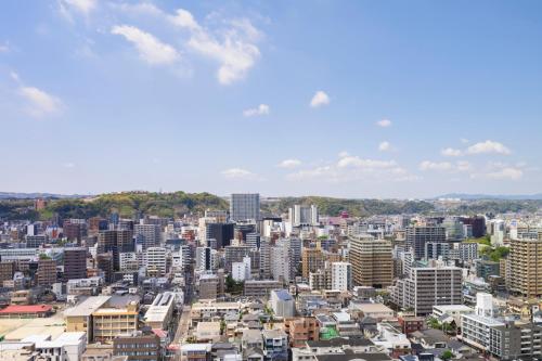 a view of a city with tall buildings at Sheraton Kagoshima in Kagoshima