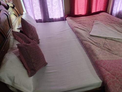 Midway Home stayにあるベッド