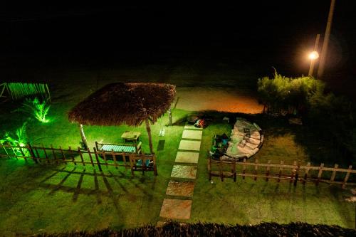 an aerial view of a resort at night at Casa Aeolus in Camocim