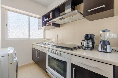 Kuchyň nebo kuchyňský kout v ubytování Lindo Depa muy cerca de Coyoacan y Universidad