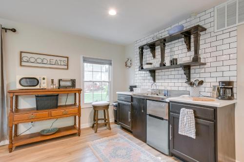 a kitchen with stainless steel appliances and a counter at Greer Guest House Less Than 1 Mi to Park and Downtown Area! in Greer