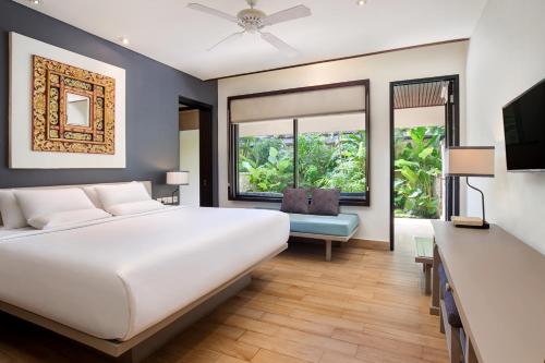 Un ou plusieurs lits dans un hébergement de l'établissement Novotel Bali Benoa