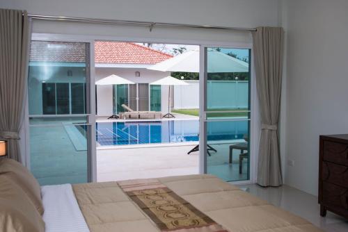 Πισίνα στο ή κοντά στο Villa Tha Maphrao